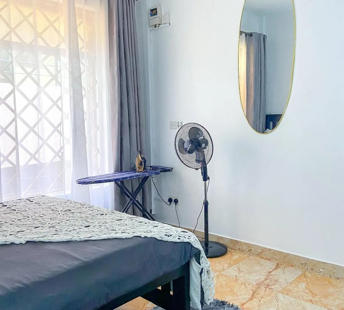 Bedroom In A Serene Environment Entebbe Apartment